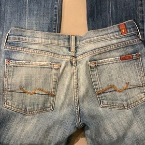 7 For All Mankind Faded Light Blue Bootcut Jeans with Curved Pocket Stitching